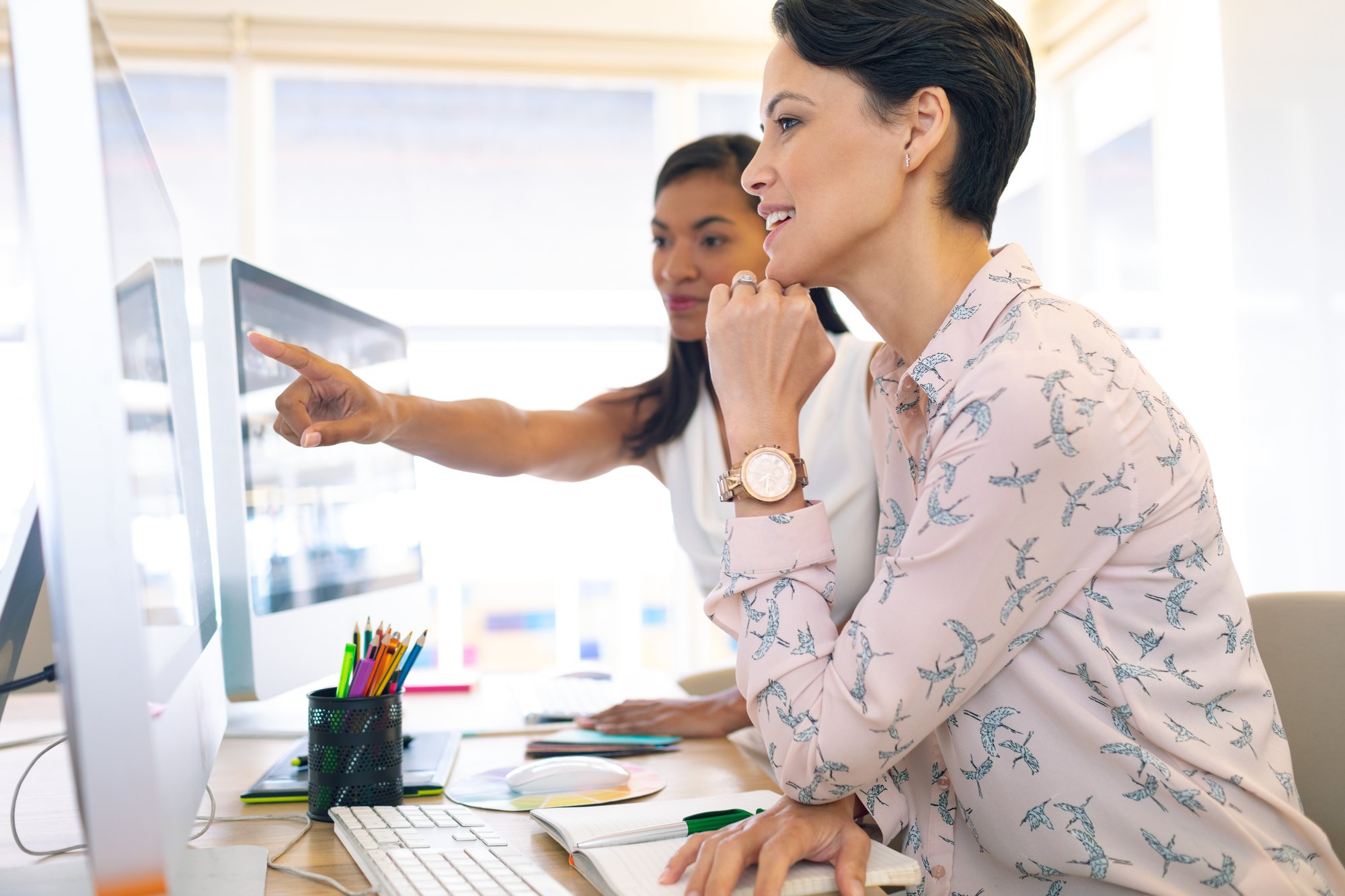 side-view-of-diverse-female-graphic-designers-disc-2023-11-27-05-20-50-utc