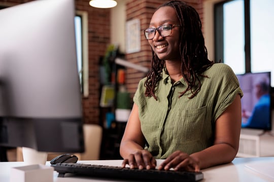 smiling-african-american-programmer-relaxing-looki-2023-11-27-04-51-11-utc