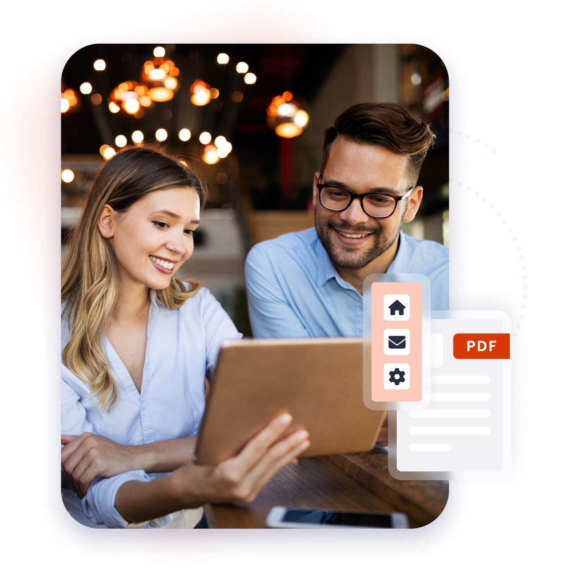 Young woman and man smiling while looking at a tablet
